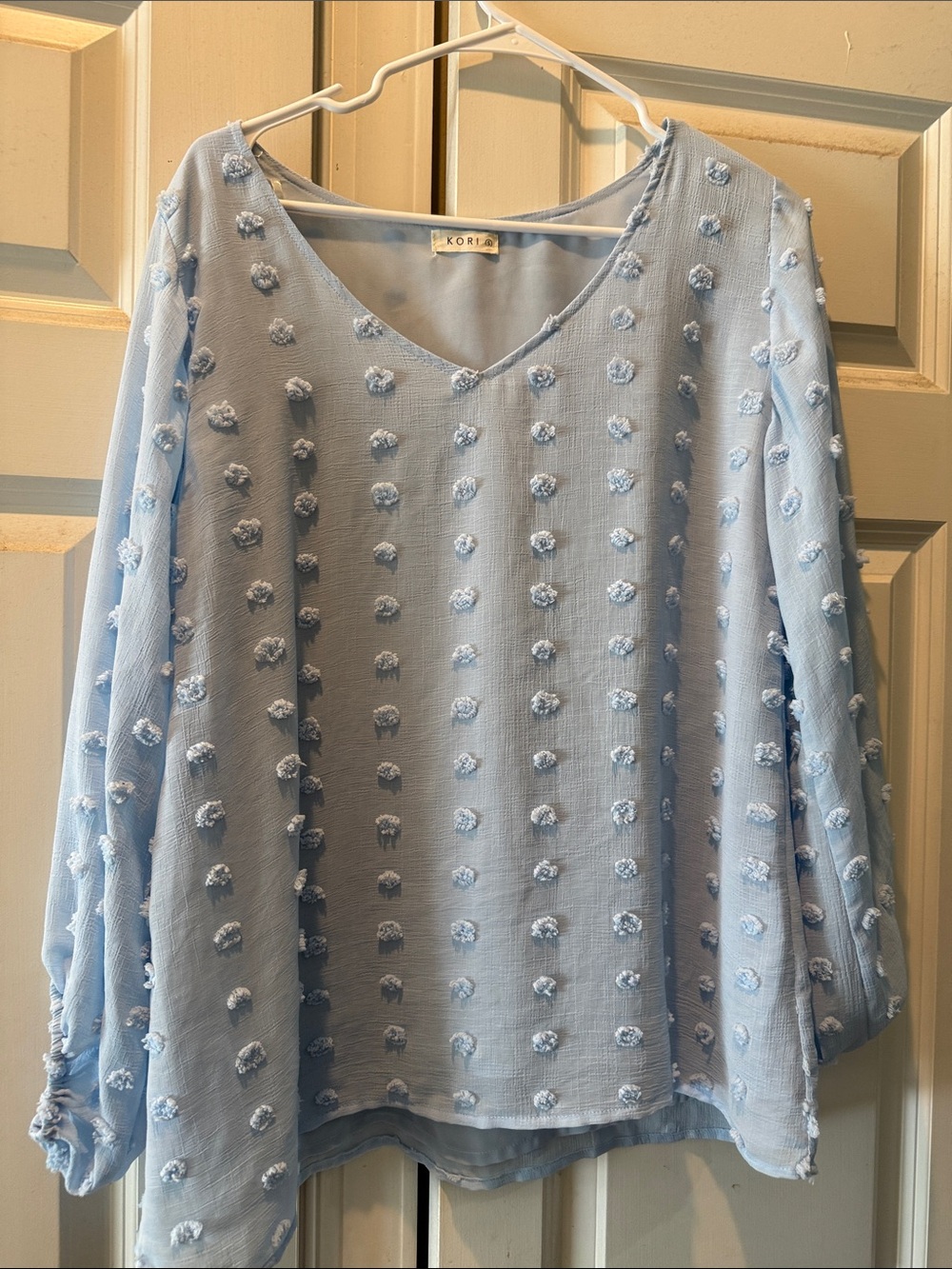 Kori Pale Blue Pom-Pom V-Neck Blouse